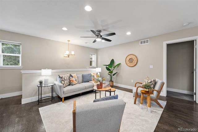 1655 N Yates St, Denver, CO 80204 - living area with a ceiling fan, recessed lighting, wood finished floors, and a chandelier