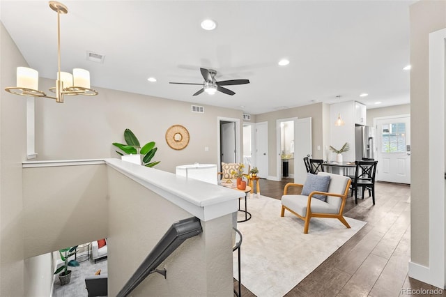 1655 N Yates St, Denver, CO 80204 - living room with wood finished floors, recessed lighting, and ceiling fan