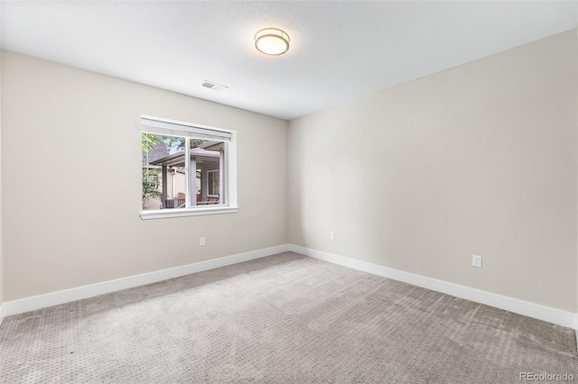 1655 N Yates St, Denver, CO 80204 - unfurnished room featuring light carpet