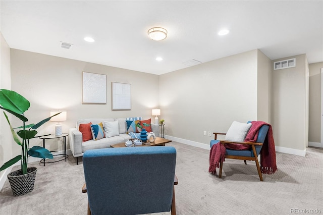 1655 N Yates St, Denver, CO 80204 - living room featuring light carpet and recessed lighting