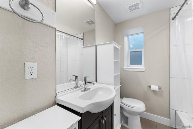 1655 N Yates St, Denver, CO 80204 - bathroom featuring vanity, a shower with shower curtain, and tile patterned flooring