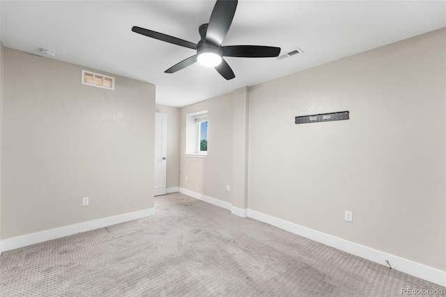 1655 N Yates St, Denver, CO 80204 - unfurnished room with ceiling fan, light colored carpet, and a smoke detector