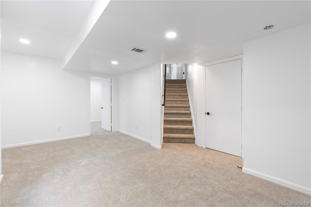 4257 S Andes Way, Aurora, CO 80013 - finished basement featuring carpet, recessed lighting, and stairway