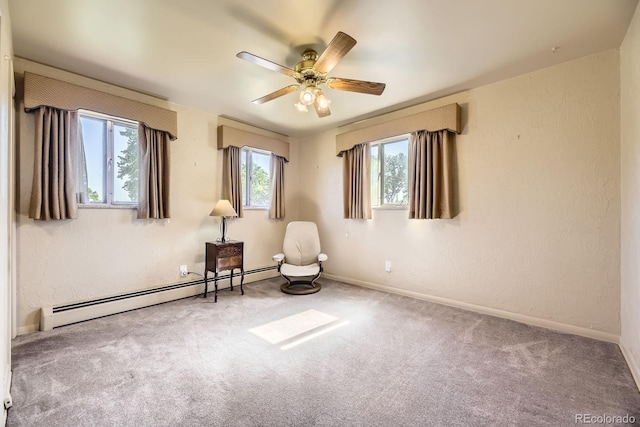 6710 W Nevada Pl, Lakewood, CO 80226 - unfurnished room with baseboard heating, ceiling fan, and carpet