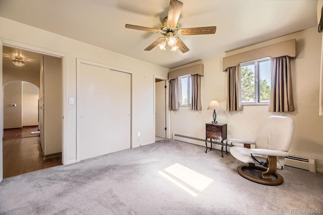 6710 W Nevada Pl, Lakewood, CO 80226 - unfurnished room with a ceiling fan, carpet flooring, and arched walkways