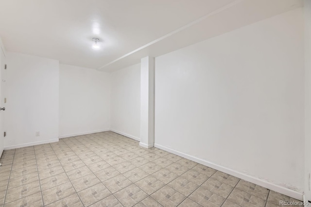 6710 W Nevada Pl, Lakewood, CO 80226 - spare room featuring baseboards