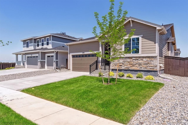 18951 E 96th Pl, Commerce City, CO 80022 - view of front of home with stone siding and driveway