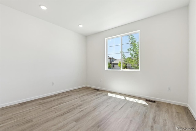 18951 E 96th Pl, Commerce City, CO 80022 - empty room with light wood-style floors and recessed lighting