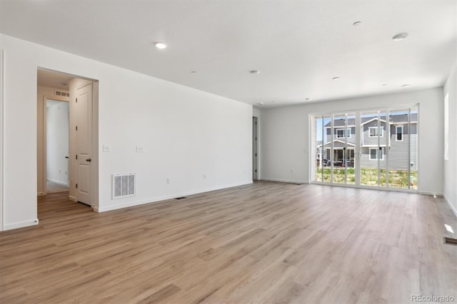18951 E 96th Pl, Commerce City, CO 80022 - unfurnished living room featuring light wood finished floors