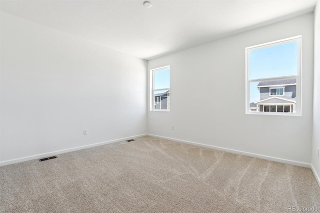 18951 E 96th Pl, Commerce City, CO 80022 - empty room with light colored carpet and baseboards