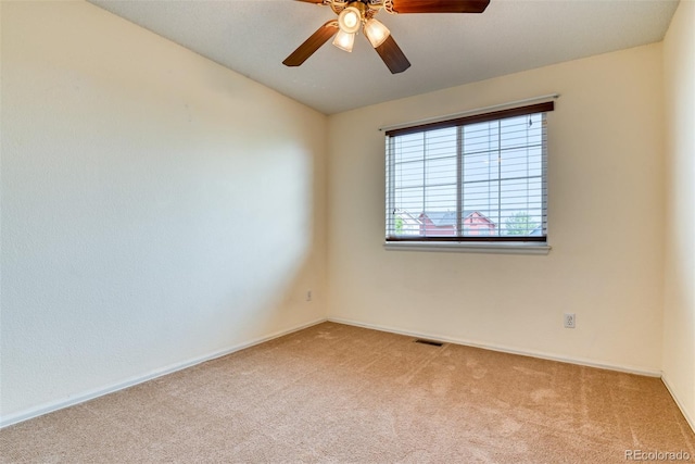 5831 Moon Ridge Dr, Colorado Springs, CO 80922 - carpeted spare room with a ceiling fan, baseboards, and vaulted ceiling