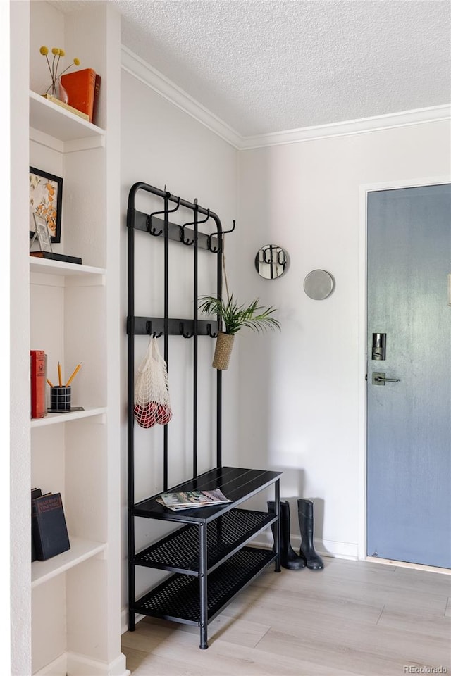 mudroom with light wood-type flooring, a textured ceiling, and crown molding