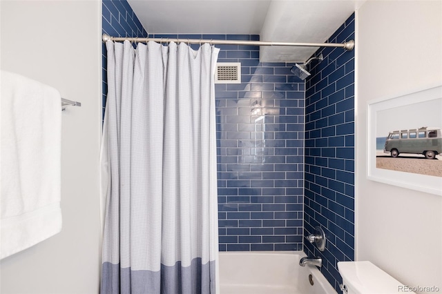 bathroom with toilet and shower / bathtub combination with curtain