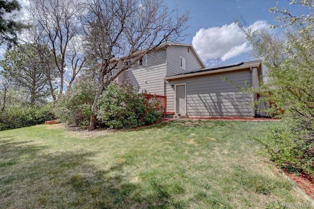view of yard featuring a deck
