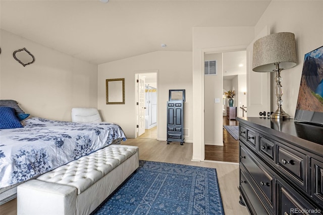 8895 Vanderwood Rd, Colorado Springs, CO 80908 - bedroom featuring light wood finished floors and lofted ceiling