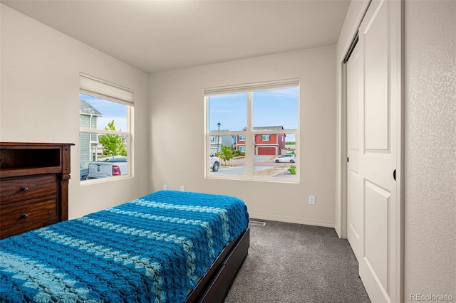 8895 Vanderwood Rd, Colorado Springs, CO 80908 - carpeted bedroom featuring baseboards