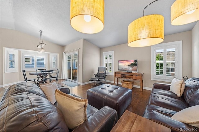 115 Quandary Ave, Berthoud, CO 80513 - living room featuring wood finished floors and lofted ceiling