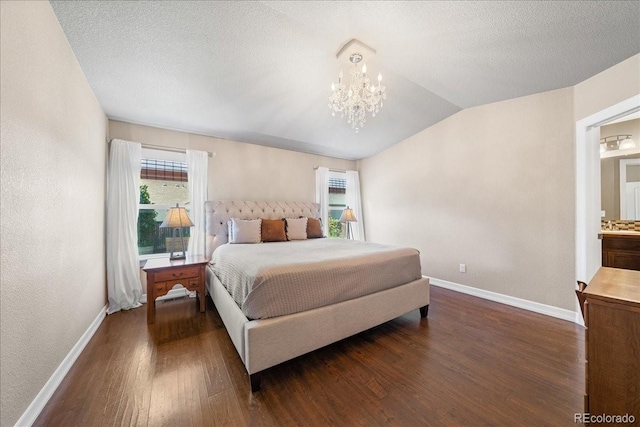 115 Quandary Ave, Berthoud, CO 80513 - bedroom featuring dark wood-style floors, multiple windows, lofted ceiling, a chandelier, and a textured ceiling