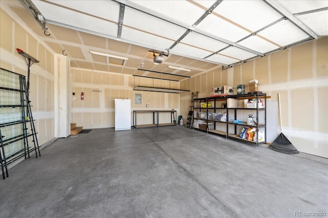 115 Quandary Ave, Berthoud, CO 80513 - garage with a garage door opener
