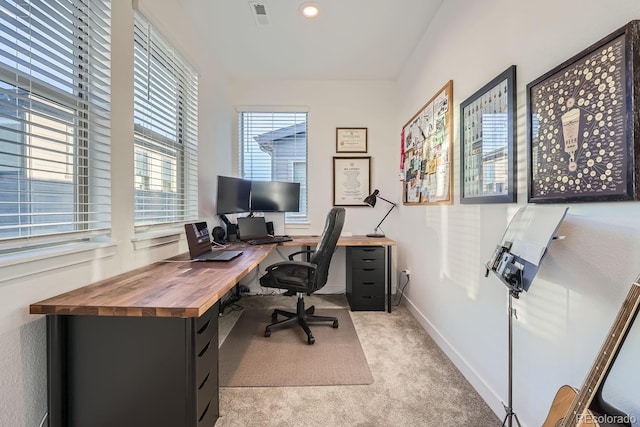 office featuring baseboards, recessed lighting, visible vents, and light colored carpet