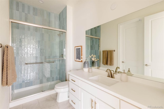 6608 S White Crow Ct, Aurora, CO 80016 - full bath with toilet, vanity, a stall shower, and tile patterned floors