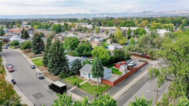 birds eye view of property featuring a residential view and a mountain view