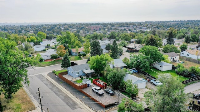 birds eye view of property with a residential view