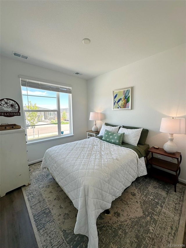 3974 Castle Vista Ln, Castle Rock, CO 80104 - bedroom with wood finished floors and baseboards