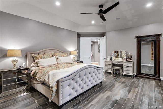 bedroom with wood finish floors, ceiling fan, ensuite bath, and recessed lighting