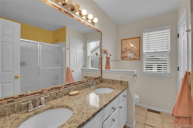 bathroom with vanity, tile patterned floors, decorative backsplash, toilet, and an enclosed shower