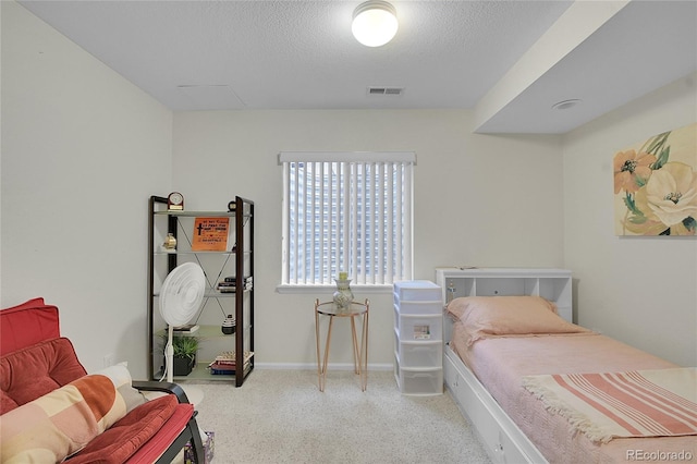 bedroom with a textured ceiling