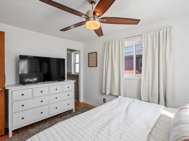 bedroom featuring dark wood-style floors and ceiling fan