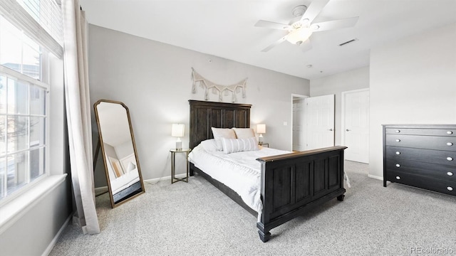 carpeted bedroom featuring ceiling fan