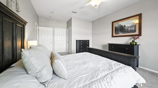 carpeted bedroom with ceiling fan