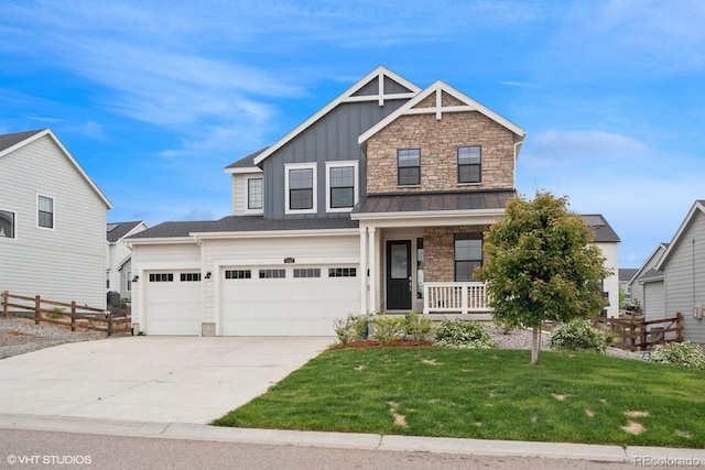 1143 Williams Loop, Elizabeth, CO 80107 - craftsman inspired home with covered porch, driveway, board and batten siding, stone siding, and a standing seam roof