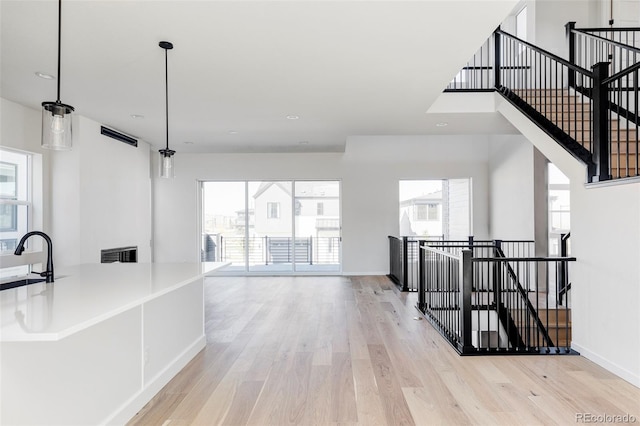 interior space featuring light hardwood / wood-style flooring and sink