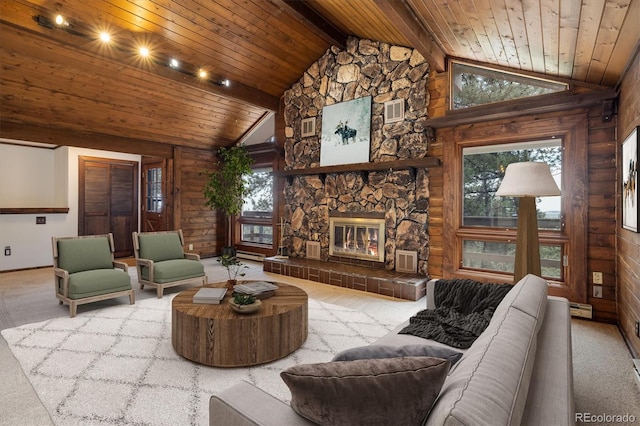 153 Divide View Dr, Golden, CO 80403 - carpeted living area with a wooden ceiling with exposed beams, plenty of natural light, a fireplace, high vaulted ceiling, and log walls