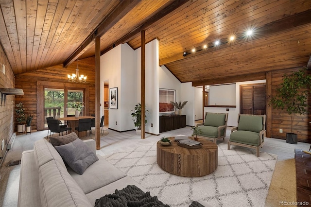 153 Divide View Dr, Golden, CO 80403 - carpeted living room featuring a chandelier, wooden ceiling, and log walls
