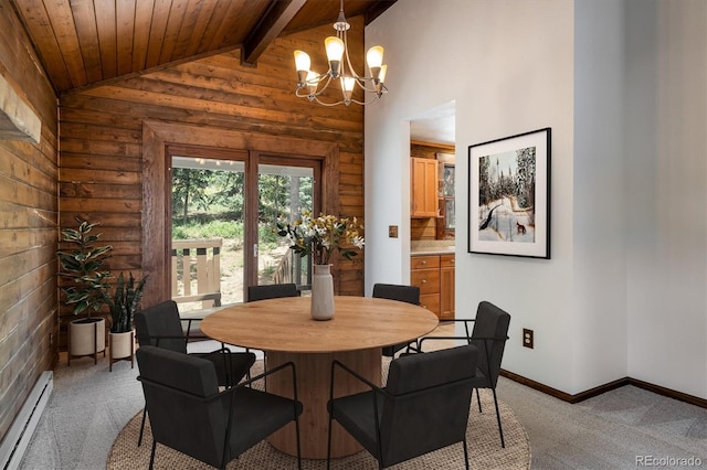 153 Divide View Dr, Golden, CO 80403 - dining area featuring baseboard heating, a chandelier, wood ceiling, and light carpet