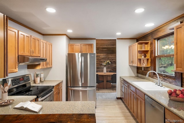 153 Divide View Dr, Golden, CO 80403 - kitchen featuring stainless steel appliances, under cabinet range hood, light wood finished floors, ornamental molding, and recessed lighting