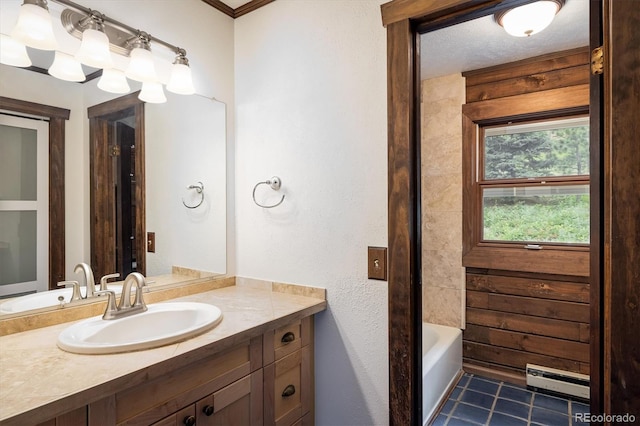 153 Divide View Dr, Golden, CO 80403 - full bathroom with vanity, a tub to relax in, a baseboard heating unit, and tile patterned floors
