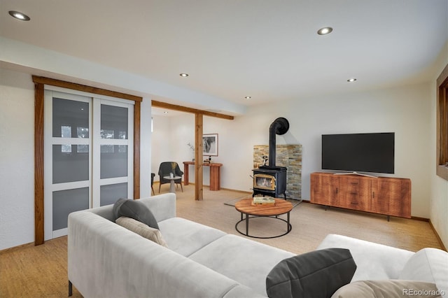 153 Divide View Dr, Golden, CO 80403 - living room featuring a wood stove, recessed lighting, and light wood-type flooring