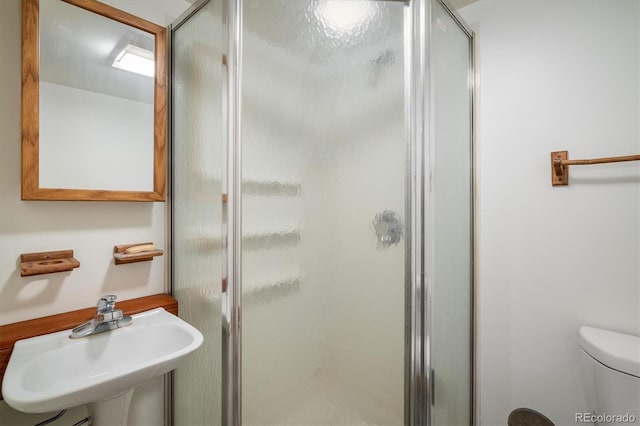 153 Divide View Dr, Golden, CO 80403 - bathroom featuring a sink and a shower stall
