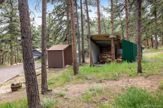 153 Divide View Dr, Golden, CO 80403 - view of pole building featuring a storage shed