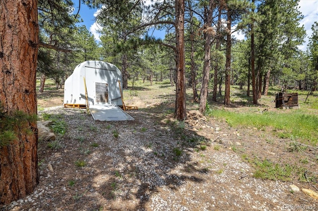 153 Divide View Dr, Golden, CO 80403 - view of yard featuring a shed