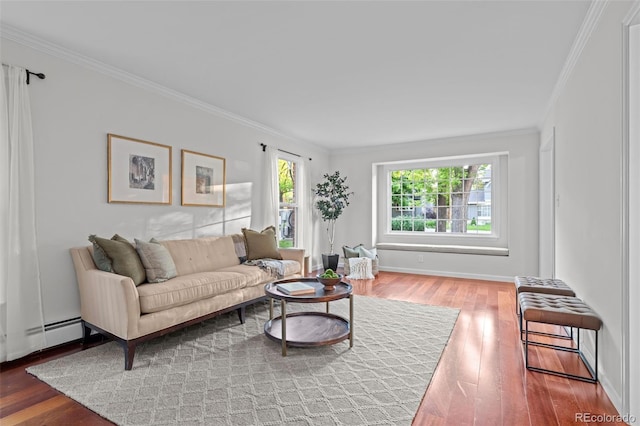 2684 Taft Ct, Lakewood, CO 80215 - living room with ornamental molding, hardwood / wood-style floors, baseboards, and a baseboard heating unit