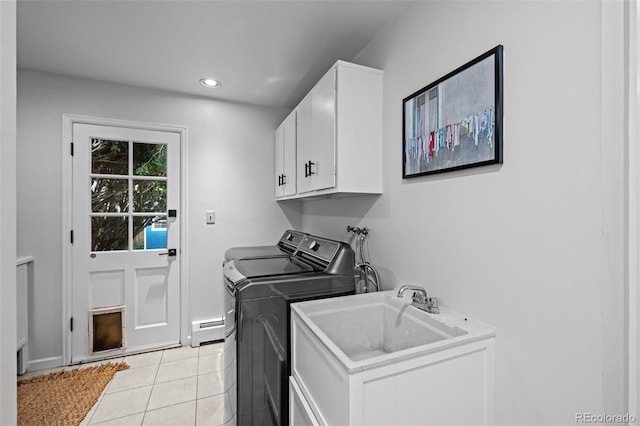 2684 Taft Ct, Lakewood, CO 80215 - laundry room with a baseboard heating unit, cabinet space, separate washer and dryer, light tile patterned flooring, and recessed lighting