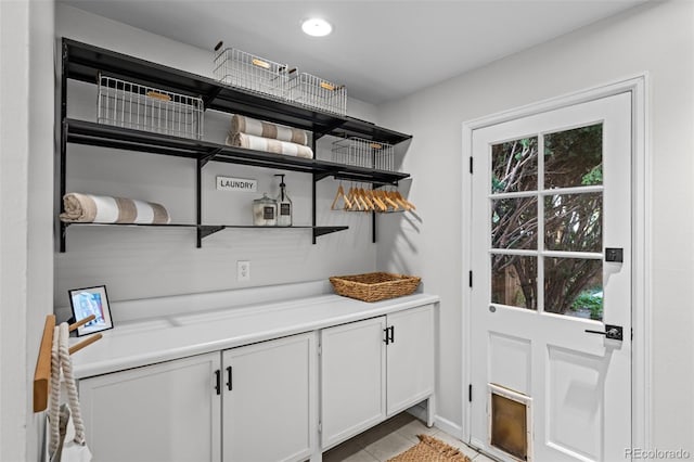 2684 Taft Ct, Lakewood, CO 80215 - mudroom featuring plenty of natural light, a bar, and light tile patterned floors