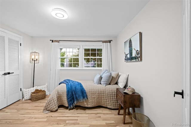 2684 Taft Ct, Lakewood, CO 80215 - bedroom featuring wood finished floors and a closet