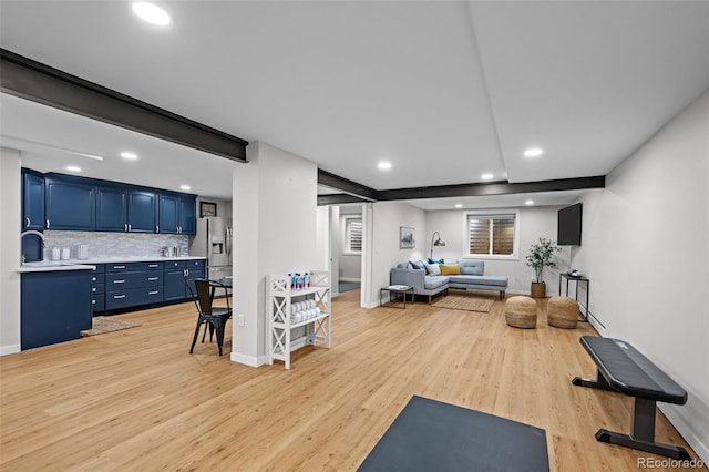 2684 Taft Ct, Lakewood, CO 80215 - exercise area with light wood-style floors, recessed lighting, baseboards, and a sink